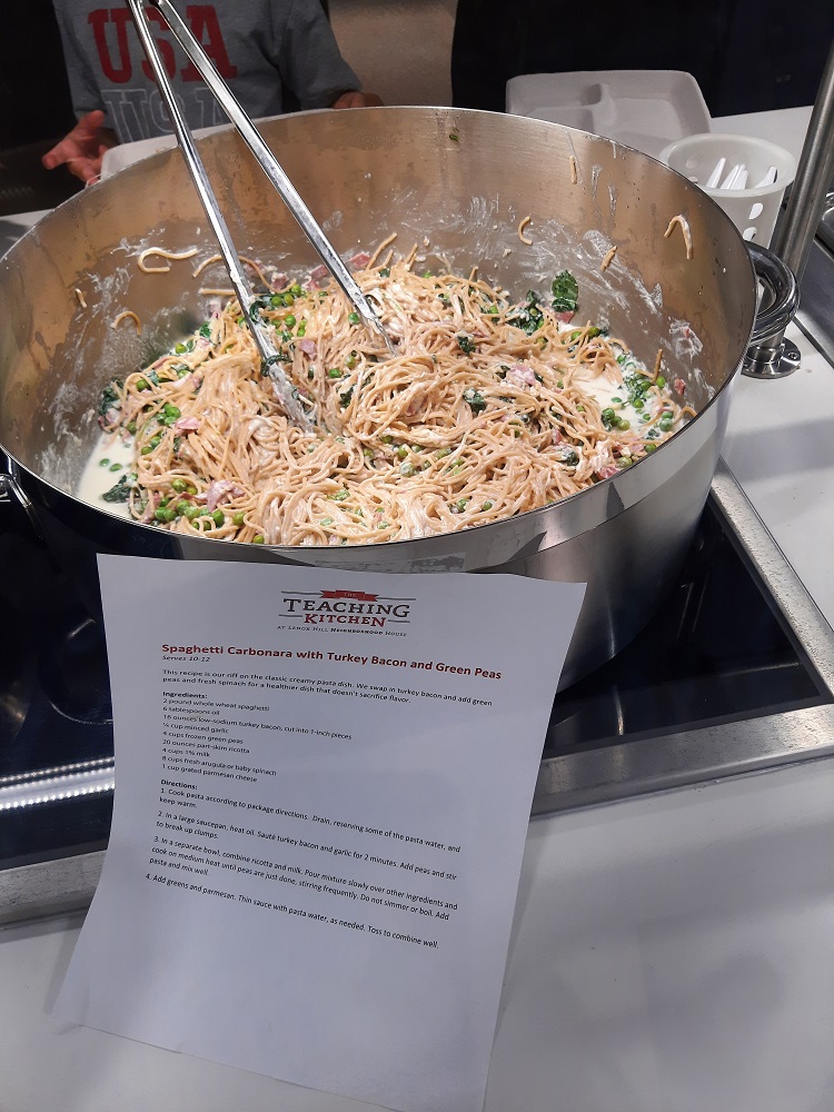 Food Services staff learned how to make spaghetti carbonara to serve to students.