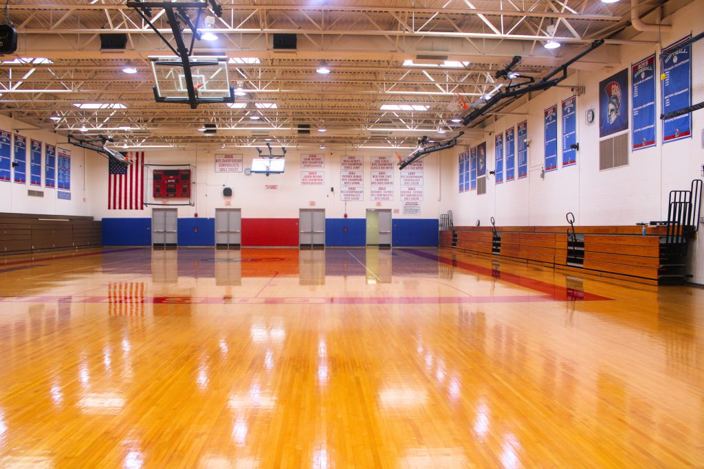 A view of the new gym floors in Goshen High School. The floors are clean and shining. 