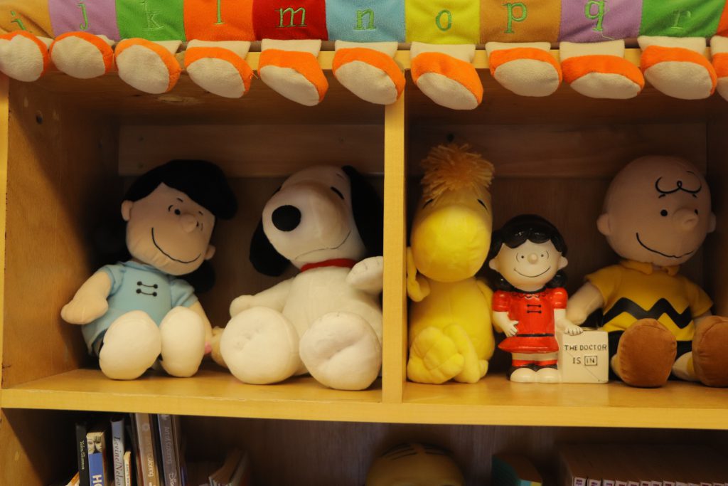 Peanuts characters on the shelf in Ms. Loftus' room. 