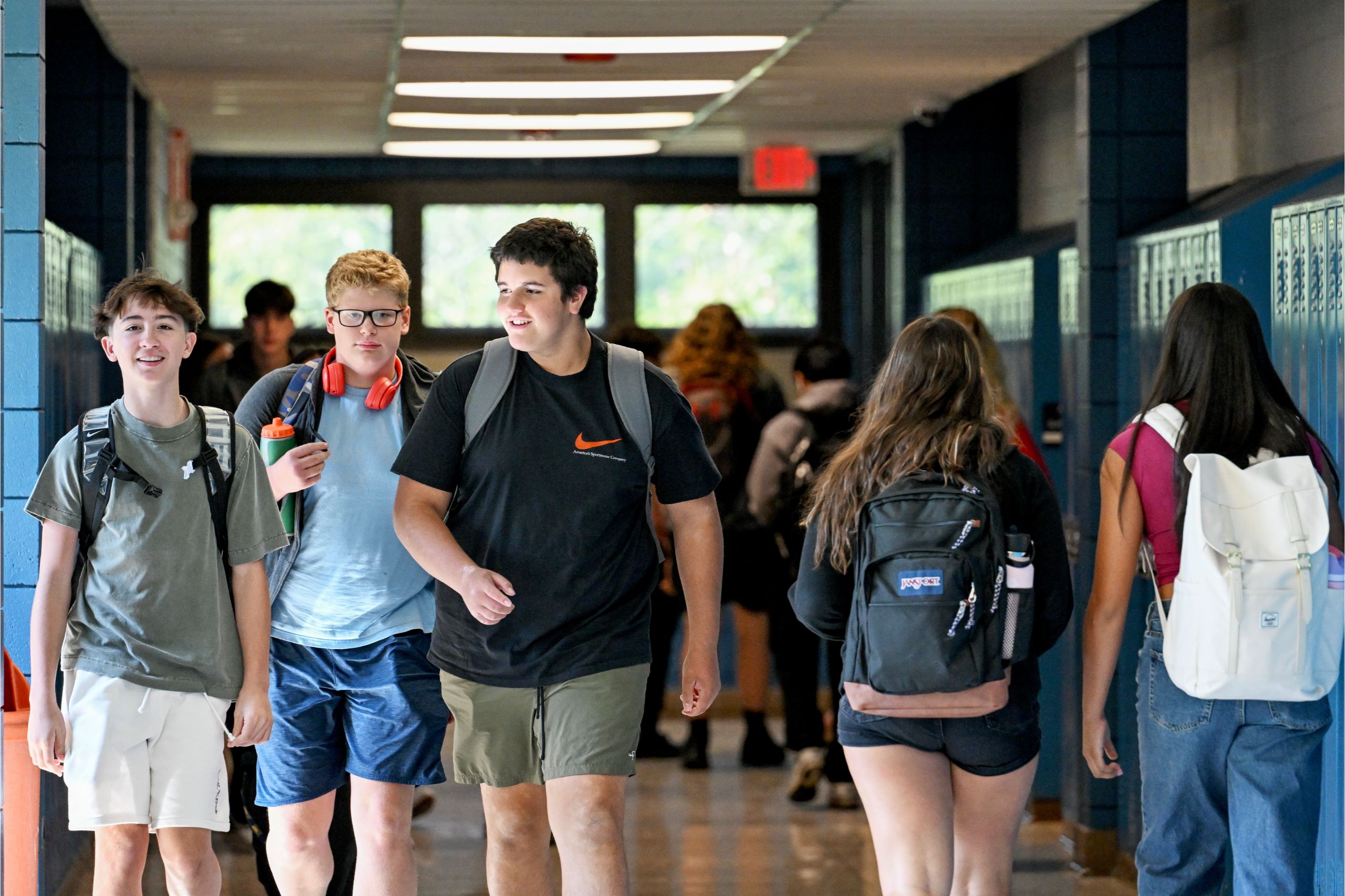 Students walk through the hallway on the first day of school at Goshen High School