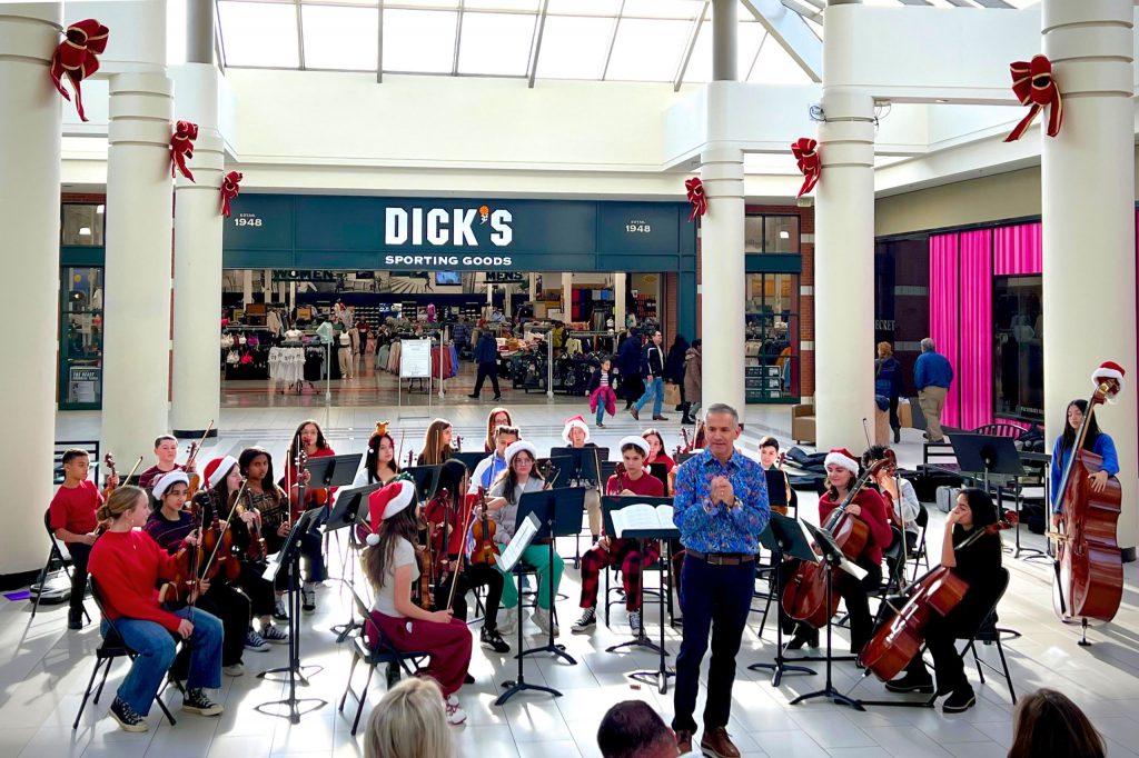 The C.J. Hooker Chamber Orchestra performs at the Galleria Mall in Middletown during the holiday season.