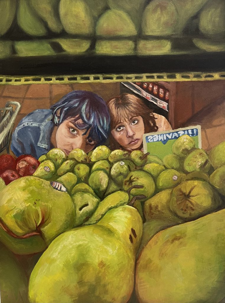 Two people look up at a pile of pears. They appear to be in a grocery store. 